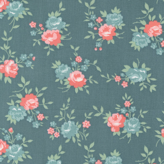 Floral pattern with pink and blue flowers on a dark blue background